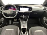 the interior of a car with a steering wheel, dashboard, and dash board