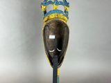 an elephant head with a crown on top of it ' s head