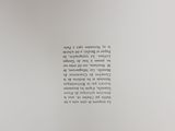 an open book with a black and white text on it