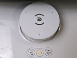 a close up of a button on the side of a machine