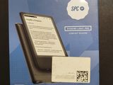 a box with a phone inside of it on a table