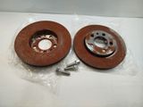 a close up of a pair of brake discs on a table