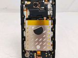 a close up of a cell phone with a broken battery