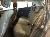 a picture of the back seats of a car in a car showroom