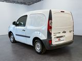 a white van that is parked in a room