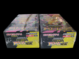 two boxes of pokemon trading cards on a black background