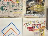 a refrigerator covered with drawings and pictures on it