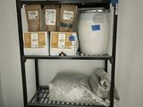 a shelf that has a lot of food on top of it