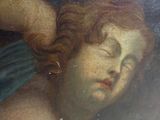 a painting of a woman laying down with her eyes closed