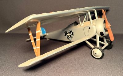 a toy airplane that is sitting on a table
