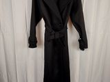 an image of a black coat on a hanger