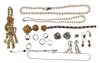 many different types of jewelry on a white background