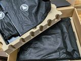 a box that has a black bag inside of it