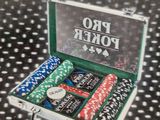 a picture of a box with poker chips and playing cards