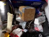 a pile of assorted items in a trash can