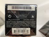 someone is holding a black box with a barcode on it