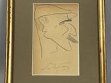 un dessin représentant un homme coiffé d'un chapeau, dans un cadre doré