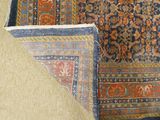 two rugs that are laying on the floor together