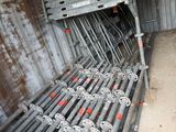 a bunch of metal pipes that are in a room