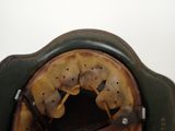 a close up of a helmet with holes in it