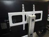 a picture of a tv mounted on a wall in a room