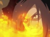 a close up of a person with a fire in their hand
