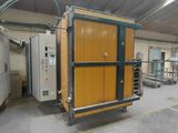 a large room with a refrigerator and other appliances in it