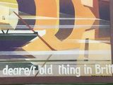 a picture of a poster on the wall of a building