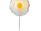 an image of a lamp with a fried egg on it