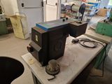 a machine that is sitting on a table in a room