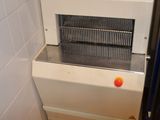 a machine that is sitting in the corner of a room