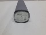 a close up of a metal object on a white surface