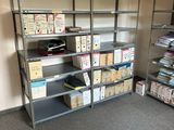 many boxes and boxes on the shelves in the room