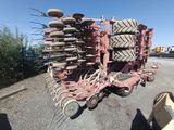 an image of a tractor that is parked on the side of the road