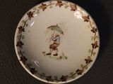 a small plate with a bird on it on a table