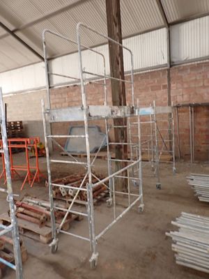 many scaffoldings in a building that is being built