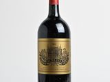 a bottle of wine that is sitting on a table