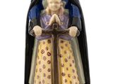 a figurine of a woman holding a child in her arms