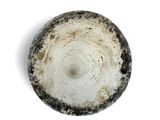 a black and white bowl on a white surface