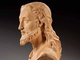 an image of a bust of jesus with long hair and beard