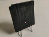a small black object that is on a table