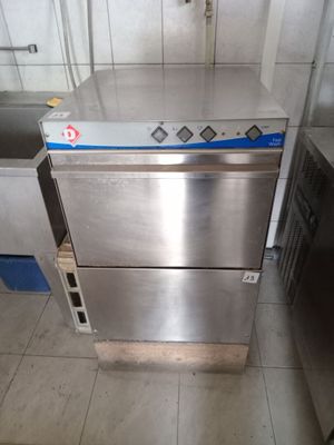a stainless steel dishwasher sitting in a kitchen