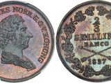 a close up of a coin with a picture of a woman on it