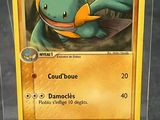 a close up of a pokemon card in a plastic case