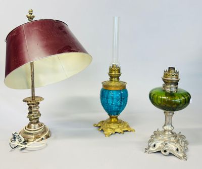 three different types of lamps and a lamp shade on a white surface