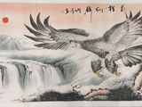 tableau représentant un aigle survolant une cascade, tenant un oiseau dans une serre