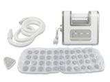 a white machine that is sitting on a white surface