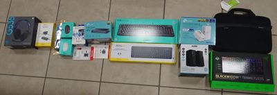 a lot of electronic devices on the floor next to each other