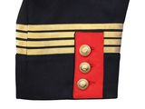 the back of a military uniform with a red button on it