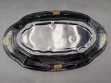 an image of a black and gold purse